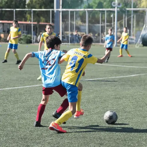 kids playing football